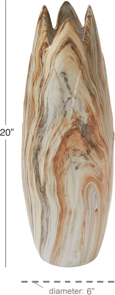 Enhance your space with this marbled ceramic vase, featuring a sleek snifter shape, angled edge, and rust accents.