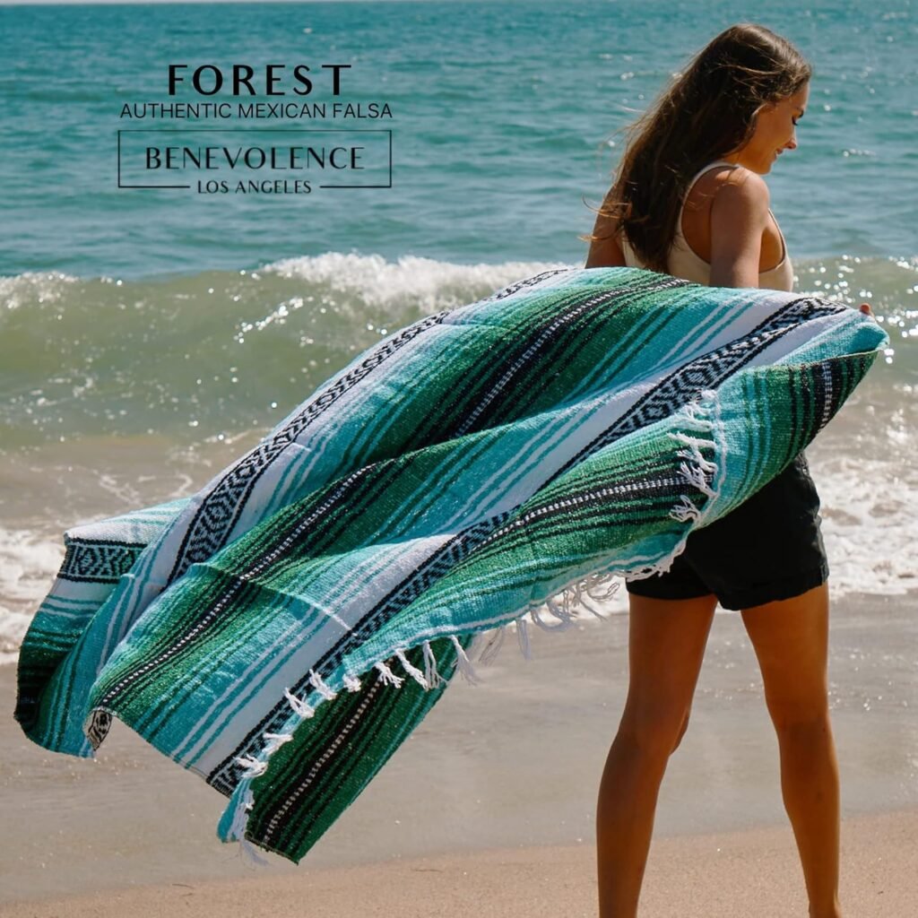 Forest Green Handwoven Mexican Blanket a woman on the beach